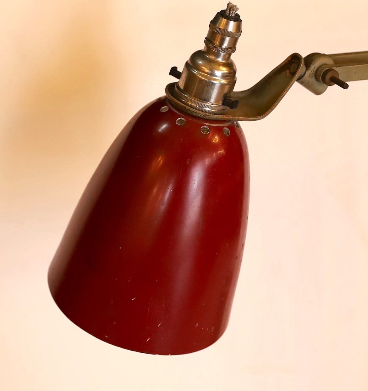 A 1950s Hardil Horstmann grey painted anglepoise lamp with red metal shade, height 52cm